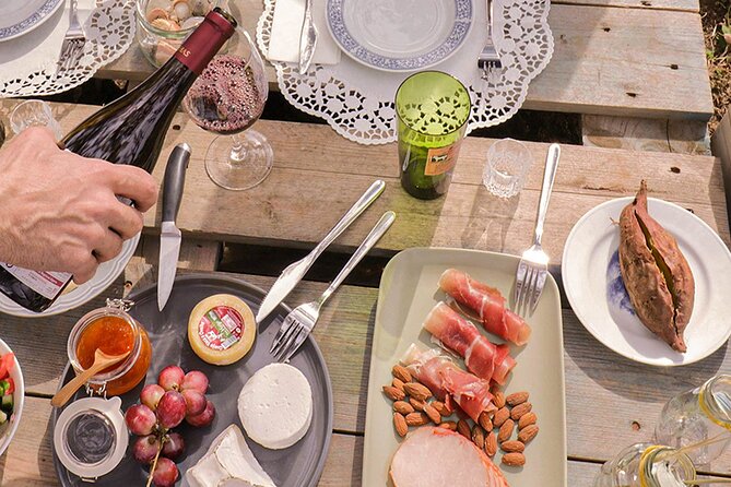 Algarve Romantic Vineyard Picnic in Carvoeiro - Picnic lunch setup: regional food, romantic ambiance, and no fuss