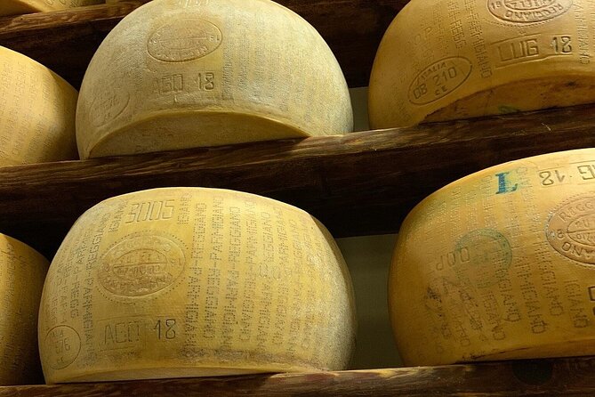 From Parma: Parmigiano,Prosciutto and winery Tour and tasting - Beneceto Cheese Factory: Brine Room, Aging Warehouse, and Paired Tastings