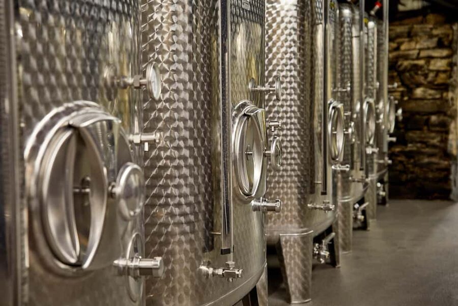 Kröv/Gut Hermes: Wine tour & tasting through vineyard, winery & champagne factory - Press hall and the grape pressing step: where you start seeing cause and effect