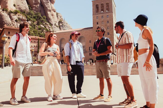 Montserrat Tour with Winery Lunch & Exclusive Cellar Experience - Abadia de Montserrat: guided highlights plus 1.5 hours to roam