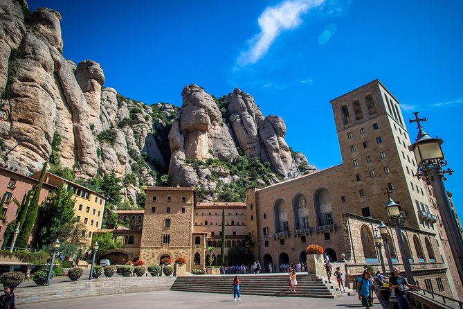Montserrat & Winery Visit Tour with Traditional Farmhouse Lunch - Montserrat Monastery: Royal Basilica, viewpoints, and serious mountain energy