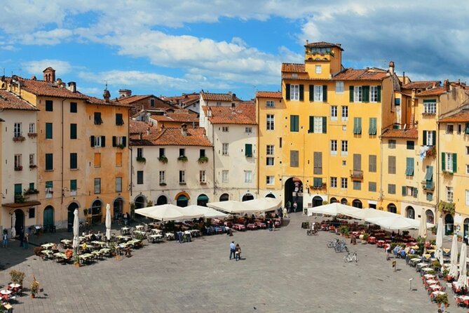 Pisa, Lucca, and Lunch at a Tuscan Winery from Livorno - Lucca’s ramparts and old piazzas: bikes, shade, and Roman traces