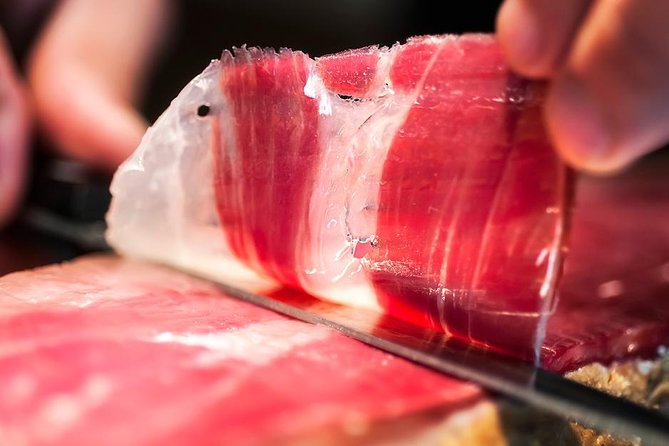 PREMIUM TAPAS TOUR: Paella, Market Tastings, and Winery - Strolling Malaga for 20 minutes: see what the food is tied to