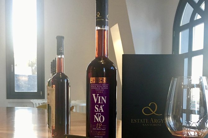 Santorini 3-Winery Tour with 12 Wine Tastings and Oia Sunset - Oia Main Street sunset: time your photos, not your patience
