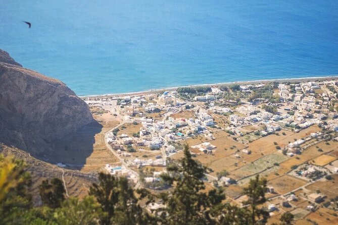 Santorini: Must-See & Winery Visit Private Tour - Perivolos black sand: a breather with real beach energy