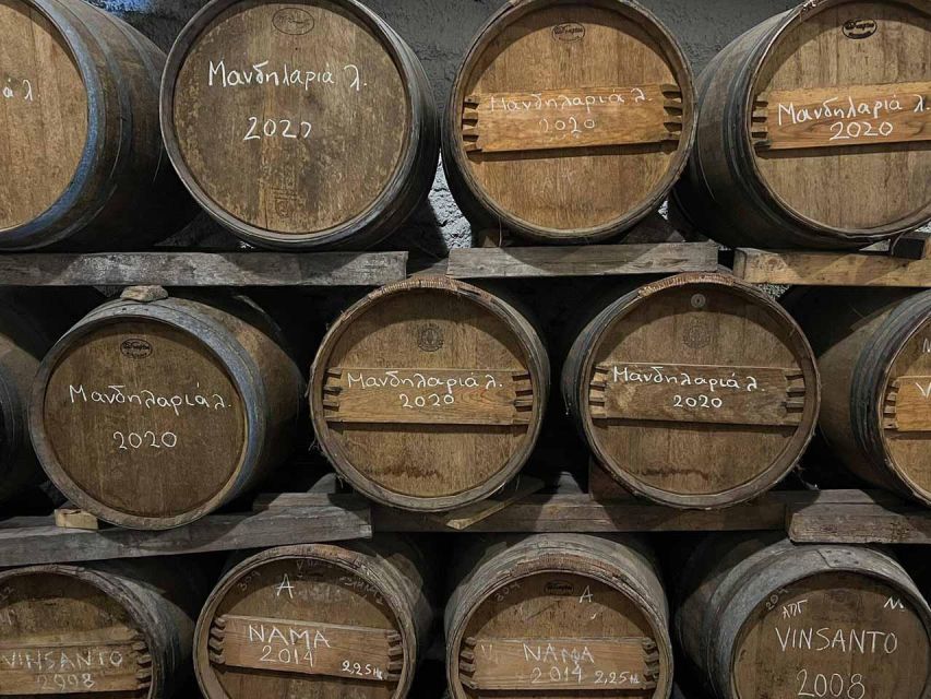 Santorini: Small-Group Sunset Wine Tour with Santo Winery - How the wineries connect: volcanic vineyards to cellar aging