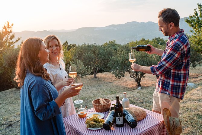 Sunset wine tasting in vineyard - What you’ll eat: olive oil & bread is the anchor, with baked extras
