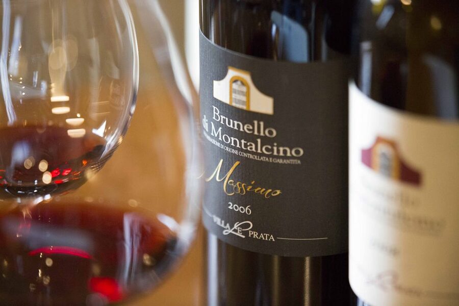 Tuscany: Montalcino Dinner at San Gimignano Winery - Winter Fireplace Room vs. Outdoor Hills in Warm Months