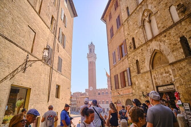 Tuscany Sunset Vespa tour with Dinner at a Chianti Winery - San Gimignano: towers, streets, and an hour that goes fast