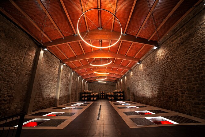 Visit to the winery with a tasting of 3 wines and appetizers - Jorge Muga and Irena: Hosts Who Make the Wine Click