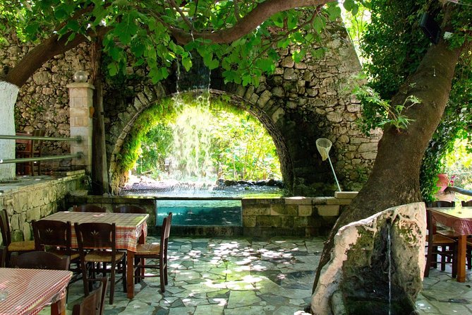 Winery Tour and Kourna's Lake from Rethymno - Transition to the Winery: Courtyard, Botanical Gardens, and Production Areas